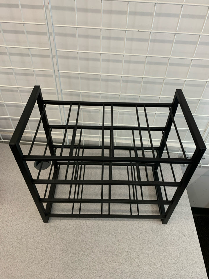 4-TIER BLACK METAL SHELF.