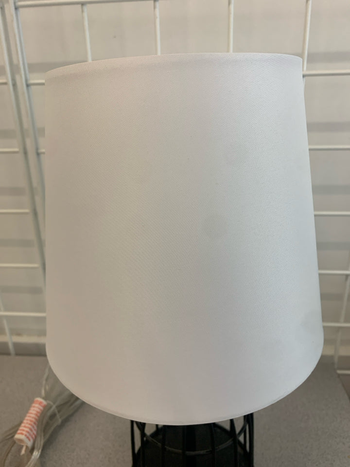 METAL CAGE LAMP WITH WHITE SHADE.
