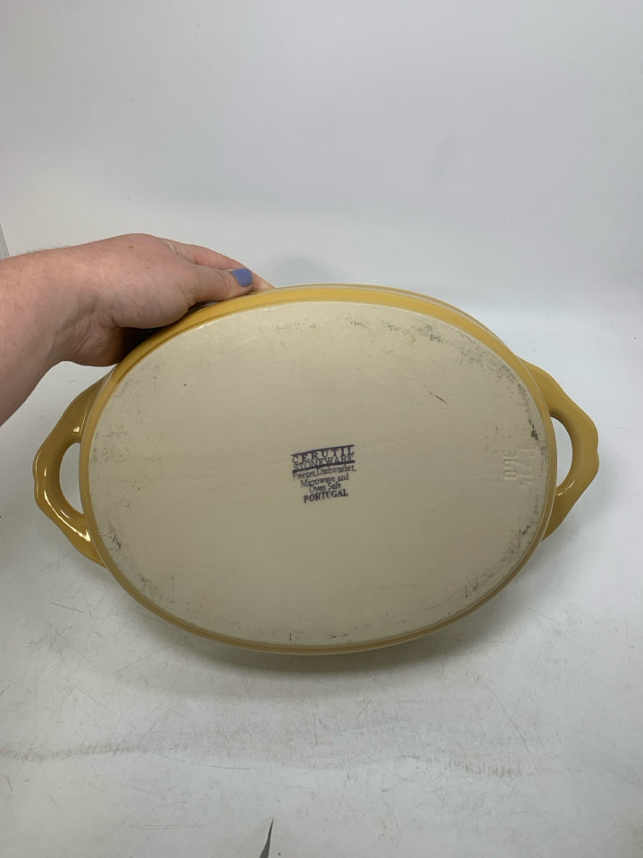 OVAL STONEWARE BAKING DISH W/ HANDLES.