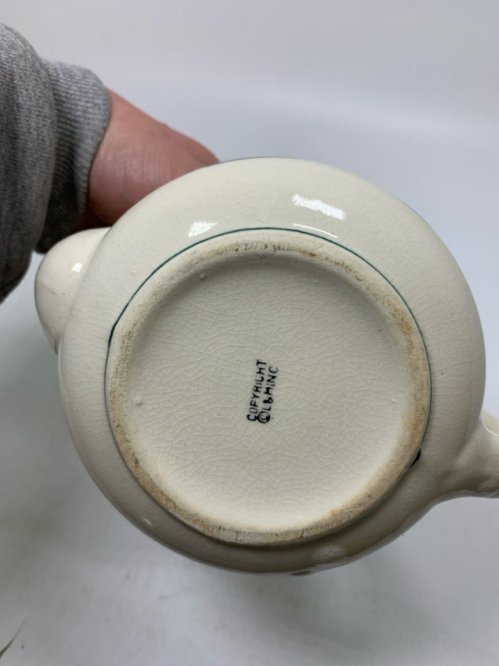 SMALL TEA POT W/ PAINTED COUPLE HOLDING HANDS.