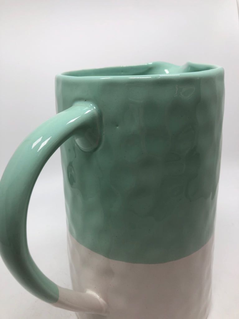 TEAL/WHITE STONEWARE PITCHER.