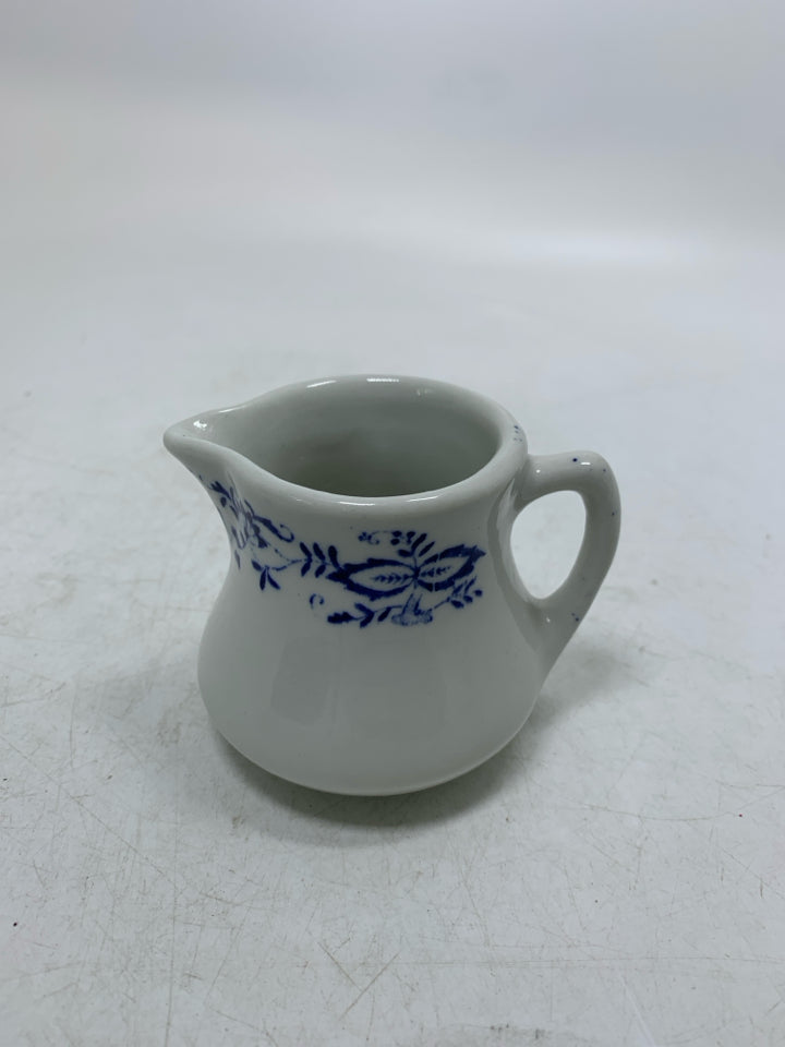 VTG STERLING EAST LIVERPOOL OHIO CREAMER W/ DARK BLUE FLOWER BOARDER.