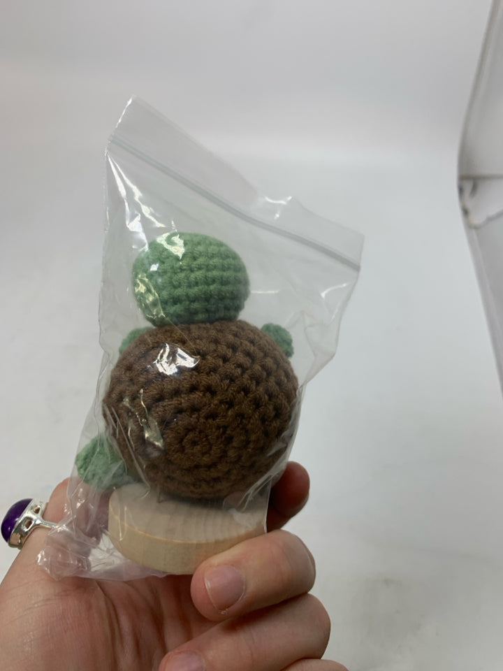 SMALL CROCHET TURTLE IN BAG.