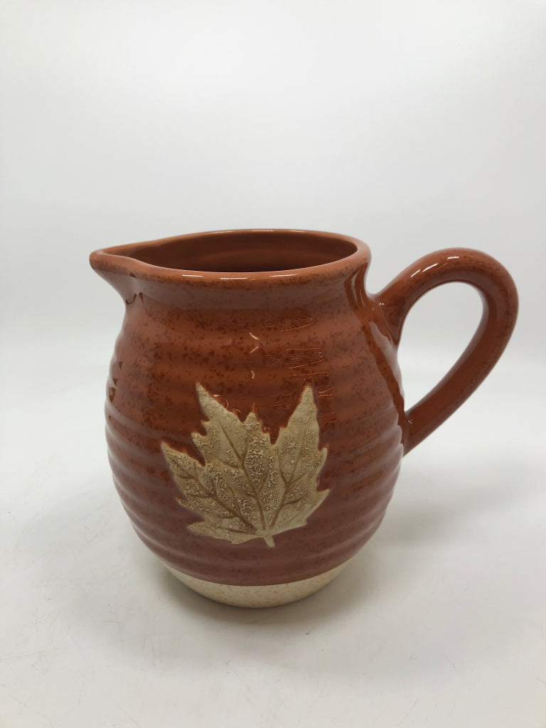LEAF EMBOSSED BROWN GLAZED PITCHER.