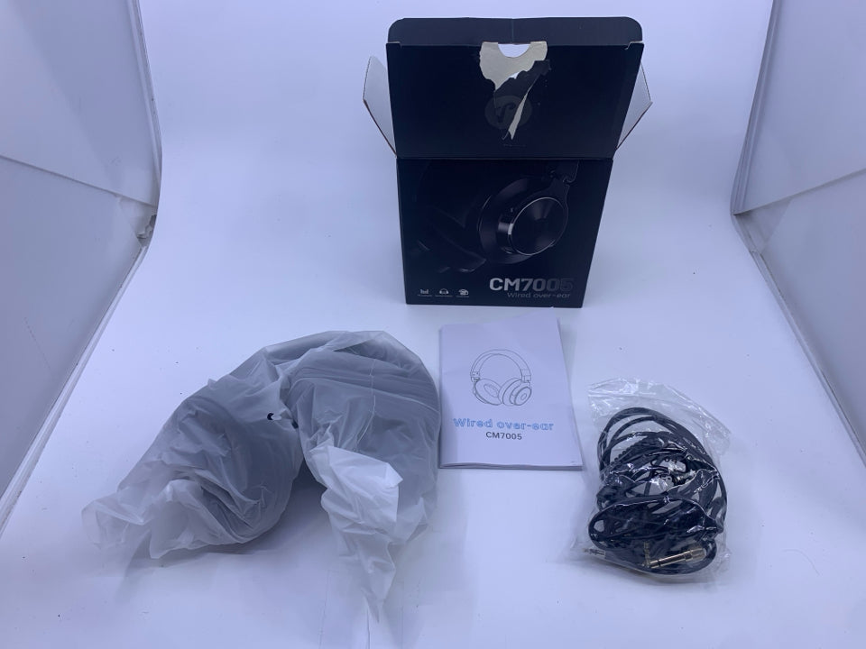 NIB WIRED OVER EAR HEADPHONES.