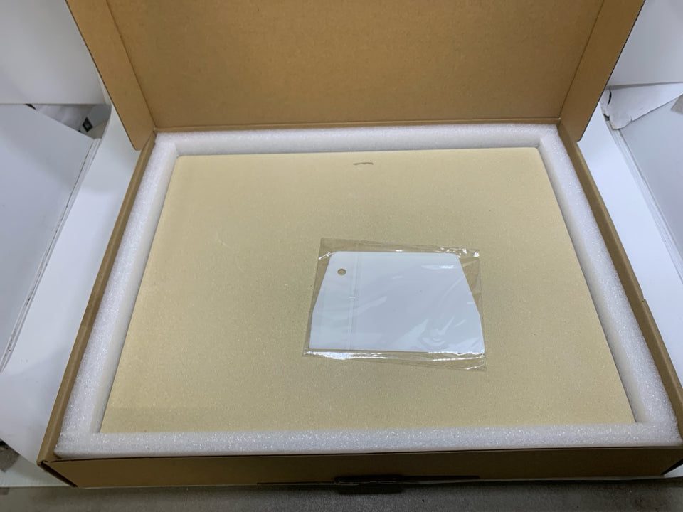 NIB UNICOOK PIZZA STONE.