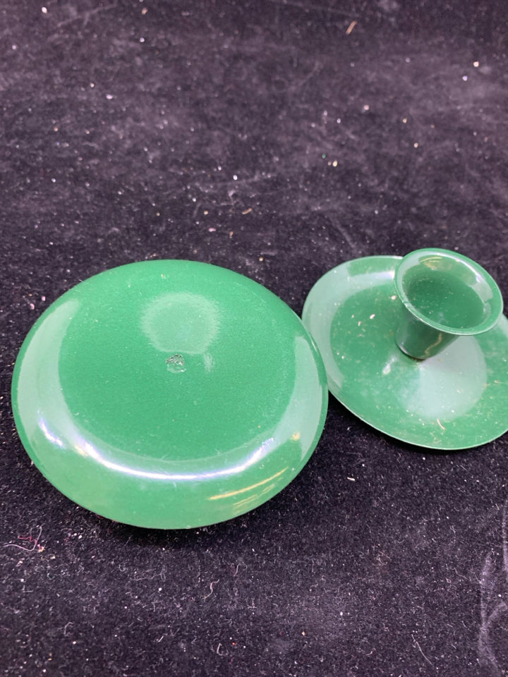 2 GREEN METAL TAPER CANDLE HOLDERS.