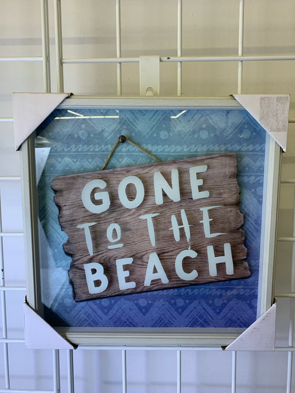 "GOING TO THE BEACH" IN WHITE FRAME.