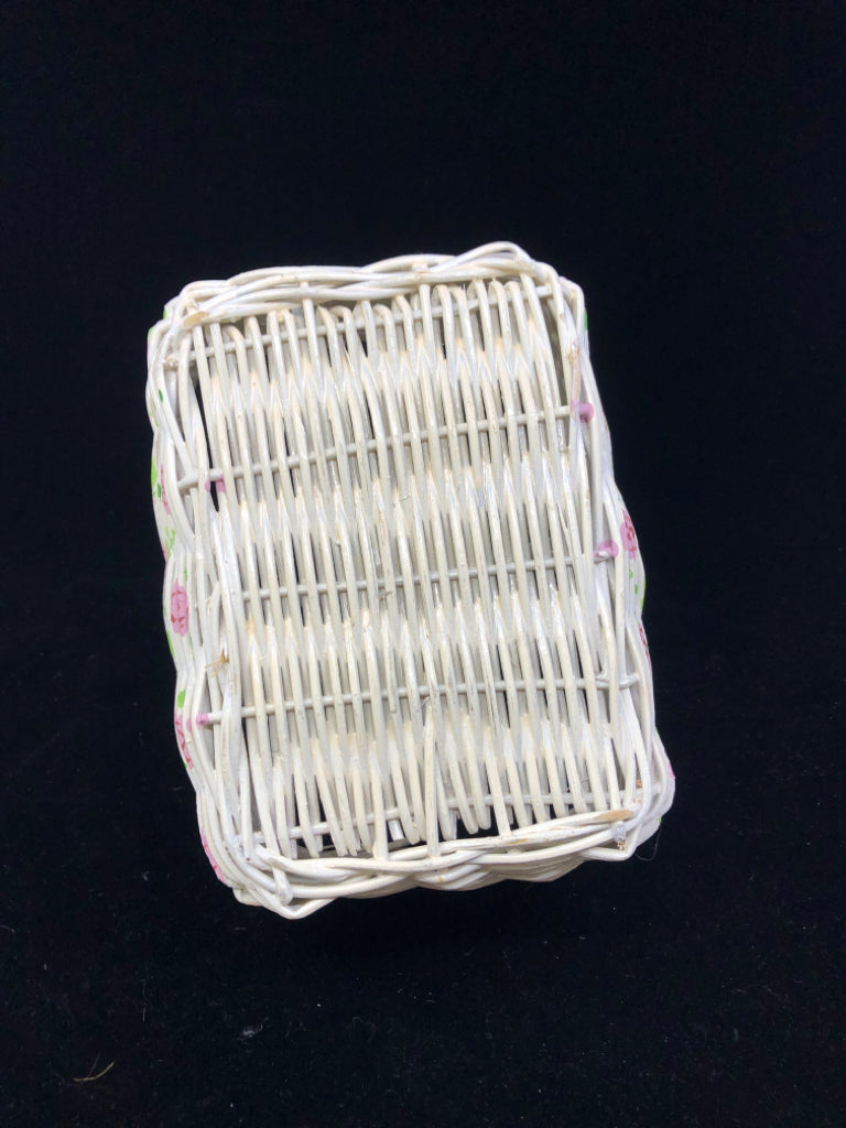 WHITE BASKET W PINK ROSES AND HANDLE.