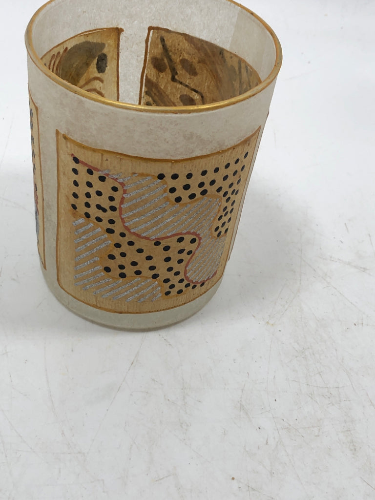 ABSTRACT T-BAG VOTIVE HOLDER CUP.