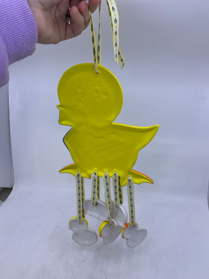 CERAMIC YELLOW DUCK W/ HANGING HATCHING DUCKLINGS.