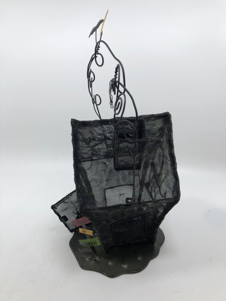METAL HANGING HAUNTED HOUSE TEA LIGHT HOLDER.