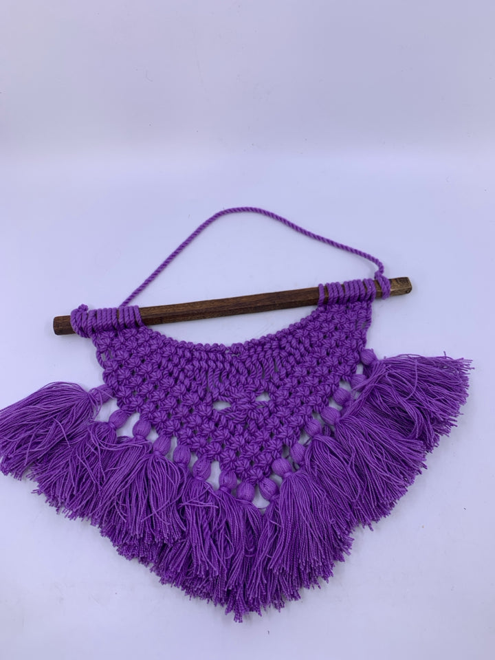 DARK PURPLE MACRAME ON WOOD DOWEL.