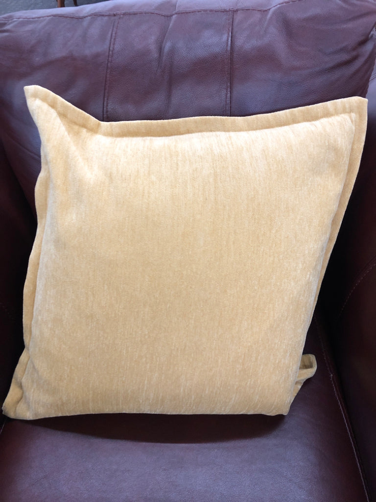 YELLOW THROW PILLOW.