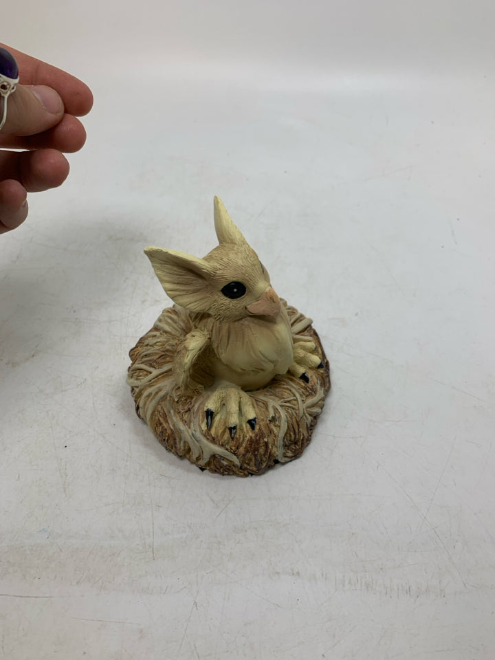 GRIFFIN W/ LONG EARS IN NEST RESIN FIGURINE.