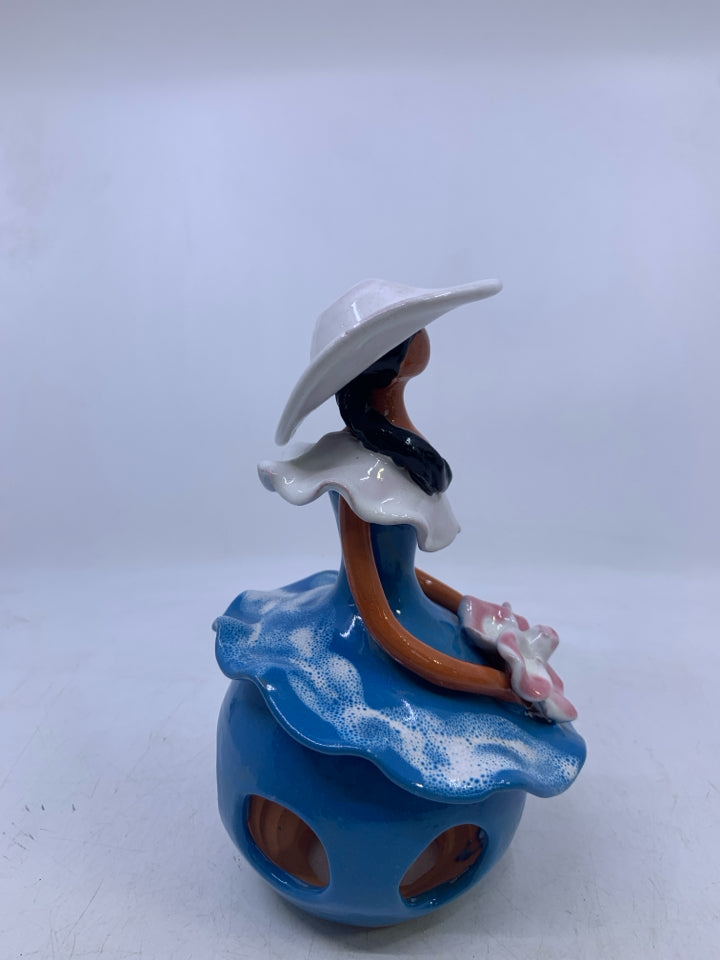 CLAY FACELESS WOMAN W/ BLUE DRESS W/ HOLES + WHITE HAT.