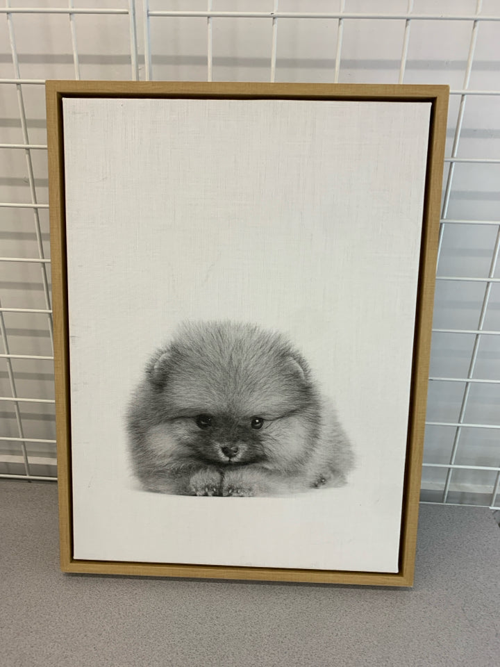 PUPPY PHOTO ON CANVAS IN WOOD FRAME.