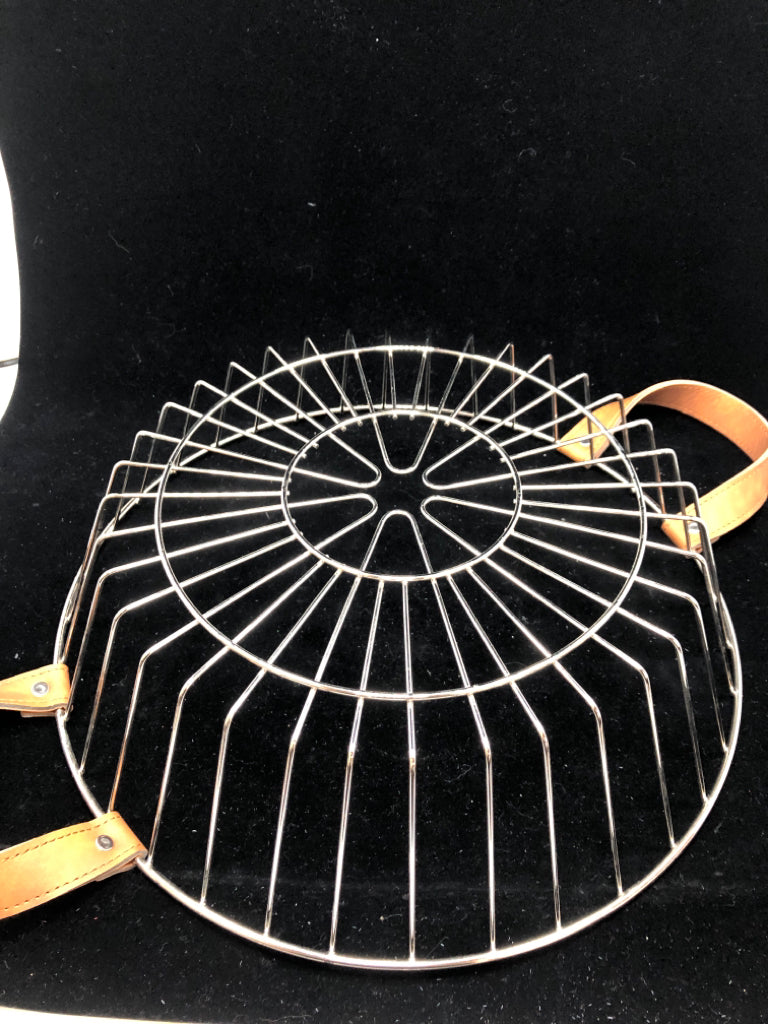 METAL BASKET W/FAUX LEATHER HANDLES.