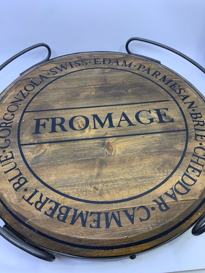 ROUND "FROMAGE" WOOD TRAY W/METAL BORDER HANDLES.