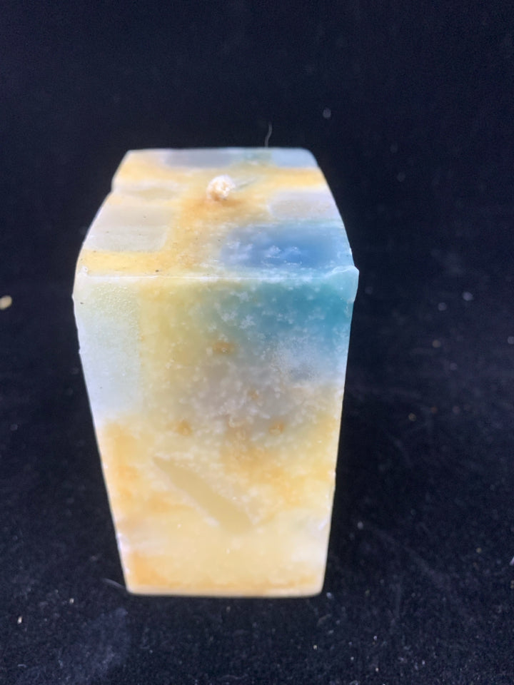 YELLOW & BLUE DECORATIVE SQUARE CANDLE.
