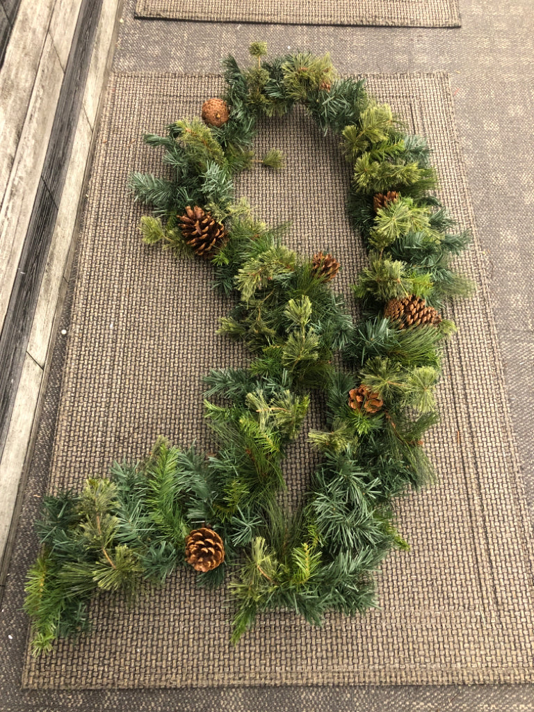 FAUX GREENERY AND PINECONE GARLAND.