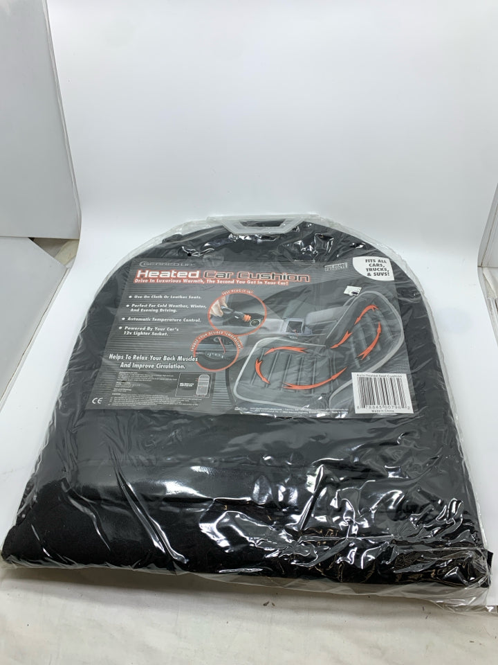 NIP HEATED CAR CUSHION.