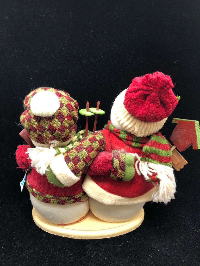 3 PLUSH SNOWMEN HOLDING SKIS.