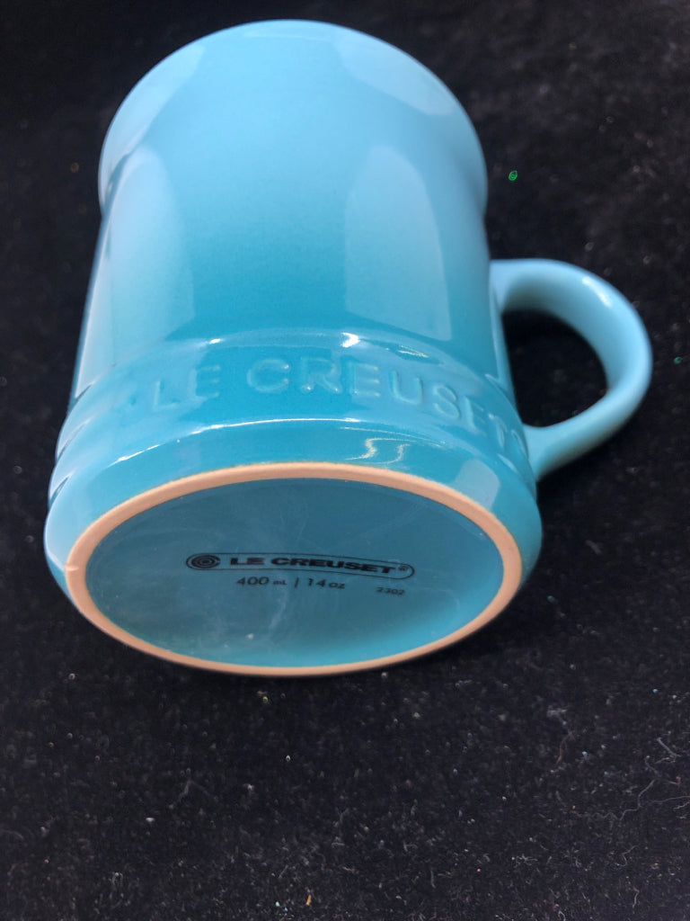 AQUA LE CREUSET MUG.