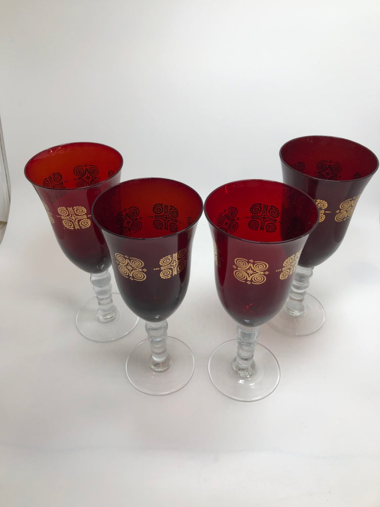 4 RUBY RED GOBLET WITH GOLD SWIRL DESIGN.