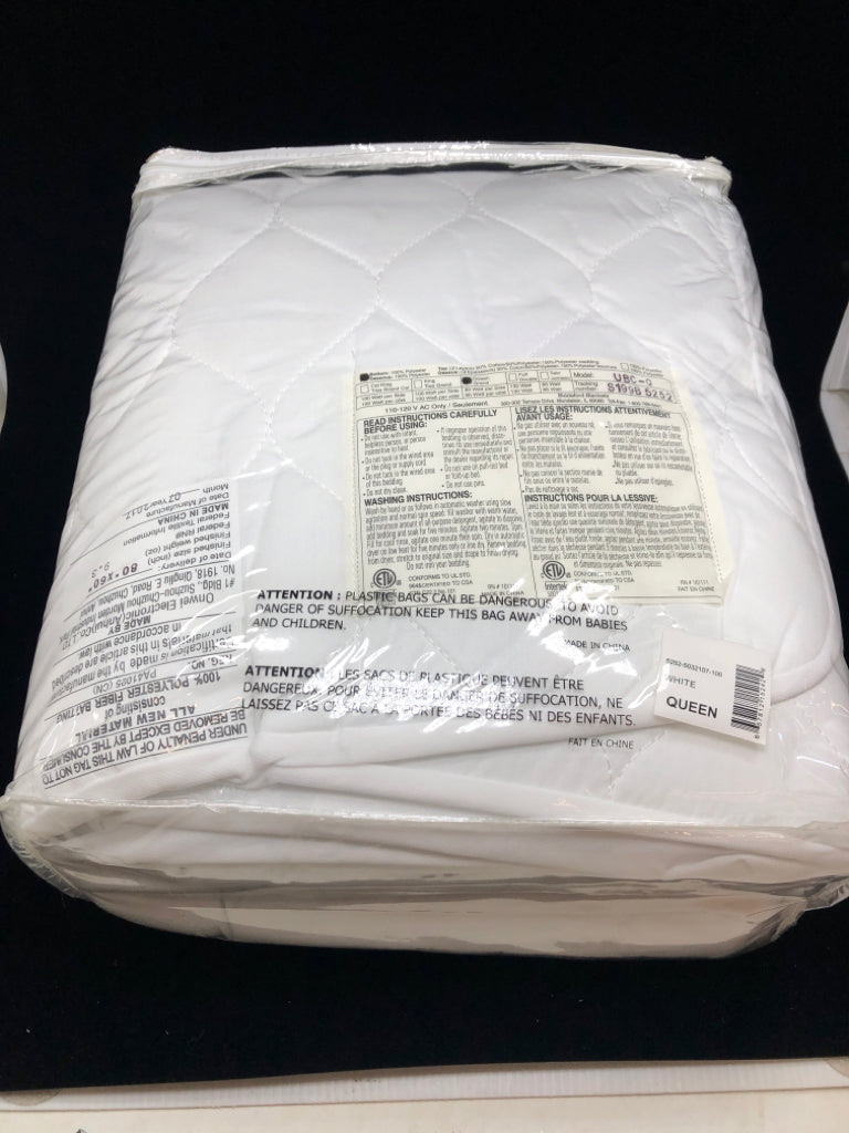 NIP HEATED QUILTED MATTRESS PAD - QUEEN.