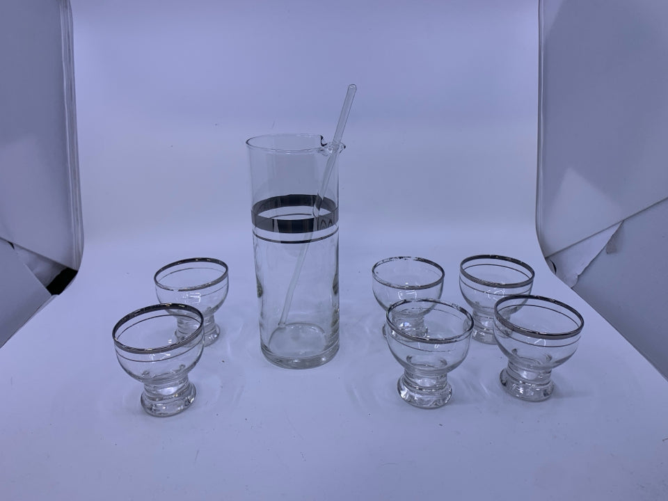 8 PC SVC 6 DECANTER DRINK SET W/ STIRRER CLEAR GLASS/SLIVER DETAILS.