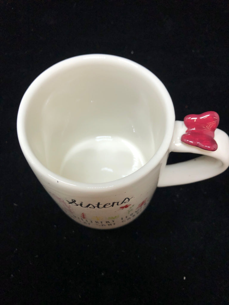SISTERS ARE FROM THE SAME GARDEN MUG.