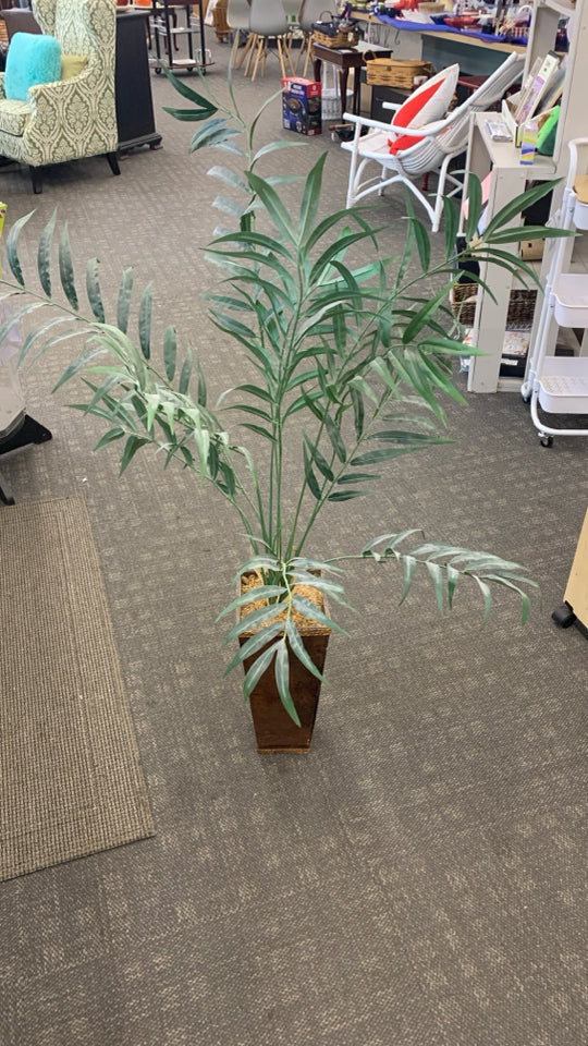 FAUX PALM PLANT IN BROWN RECTANGULAR POT.