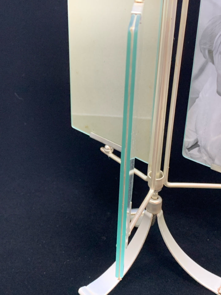 SILVER ROTATING 3 SECTION PHOTO FRAME.