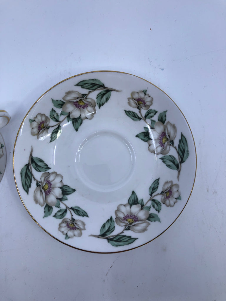 VTG WHITE FLORAL TEACUP AND SAUCER.