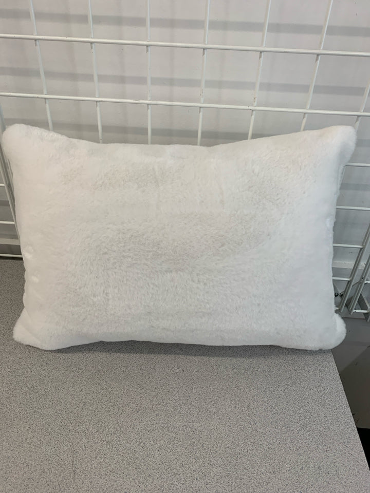 WHITE RECTANGLE FUZZY PILLOW.
