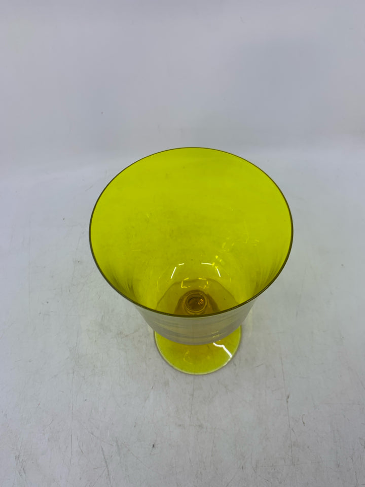 FOOTED THIN GLASS YELLOW PILLAR CANDLE HOLDER.