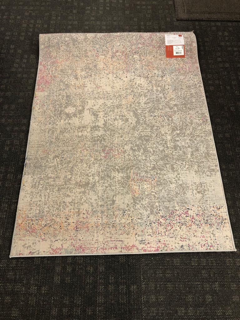 MULTI-COLORED ABSTRACT AREA RUG.