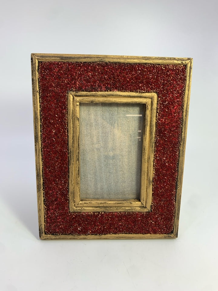 RED BEADED PICTURE FRAME.