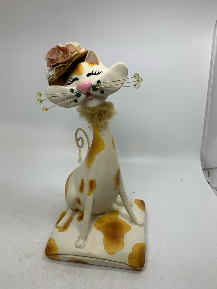 RESIN CREAM/ORANGE CAT W/ HAT/SCARF ON.