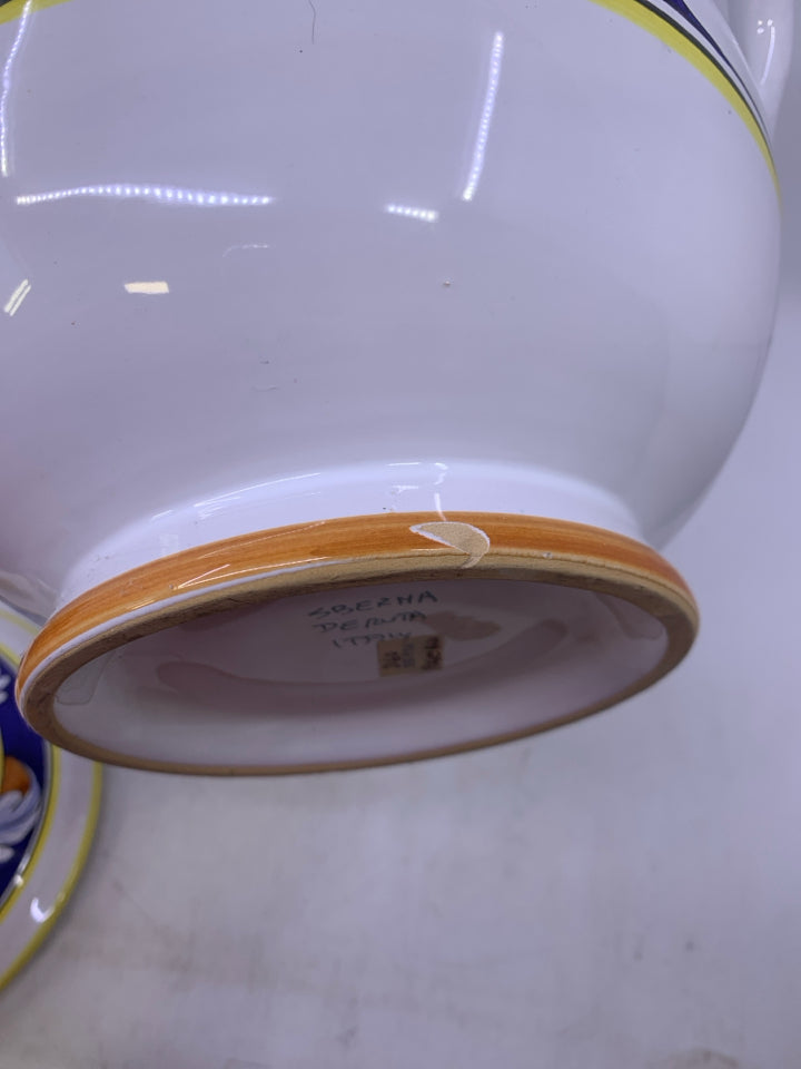 WHITE W/ COBALT BLUE BANDS ORANGE/ YELLOW LEAVES.