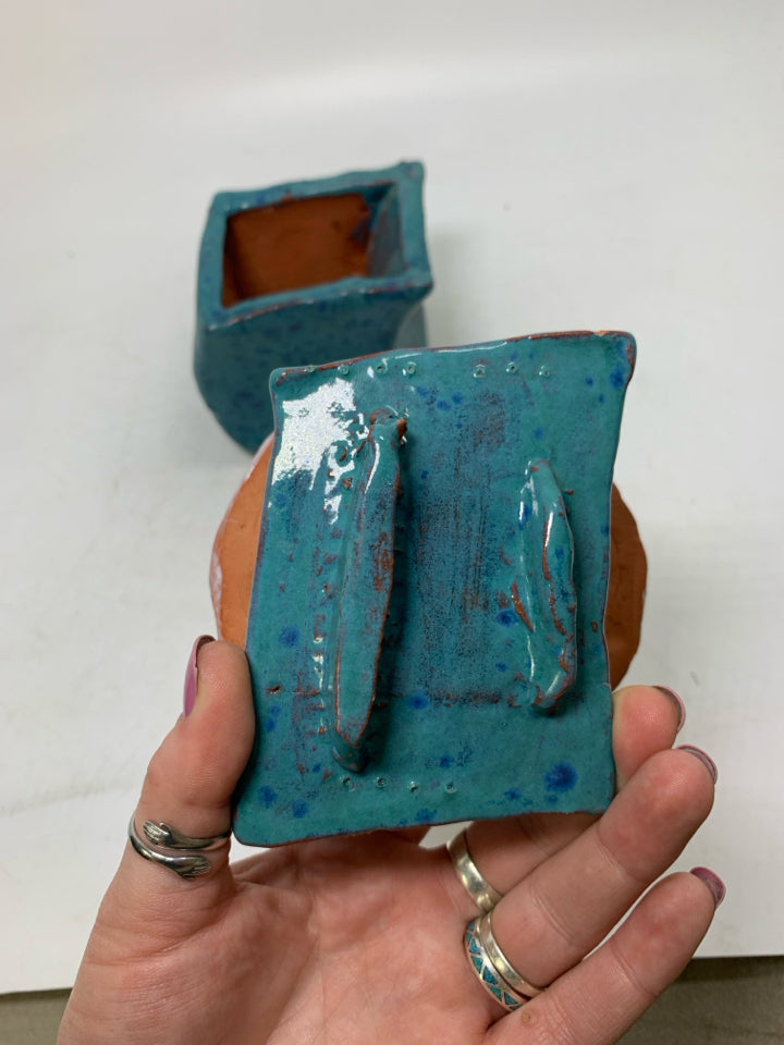 HOME MADE BLUE CANISTER W/ MUSHROOM TOP.
