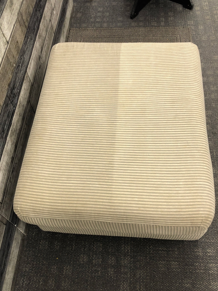 TAN/GREY STRIPED OTTOMAN.