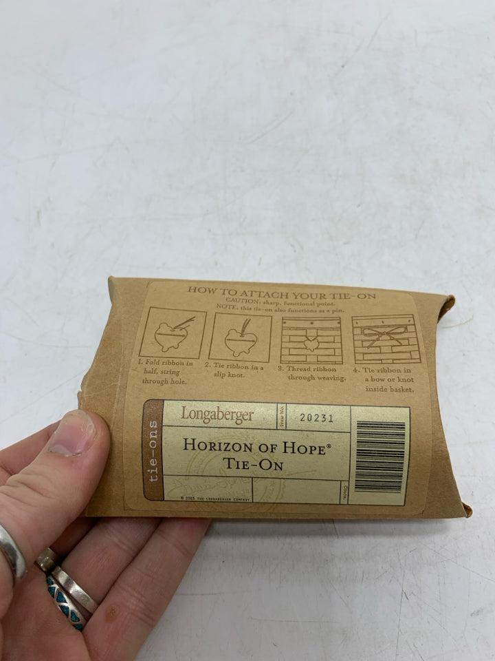 A HORIZON OF HOPE TIE ONE IN PACKAGE.