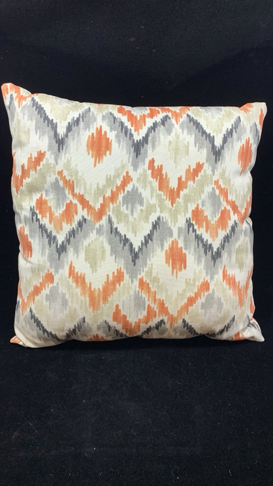 ORANGE ARROW DESIGN PILLOW.