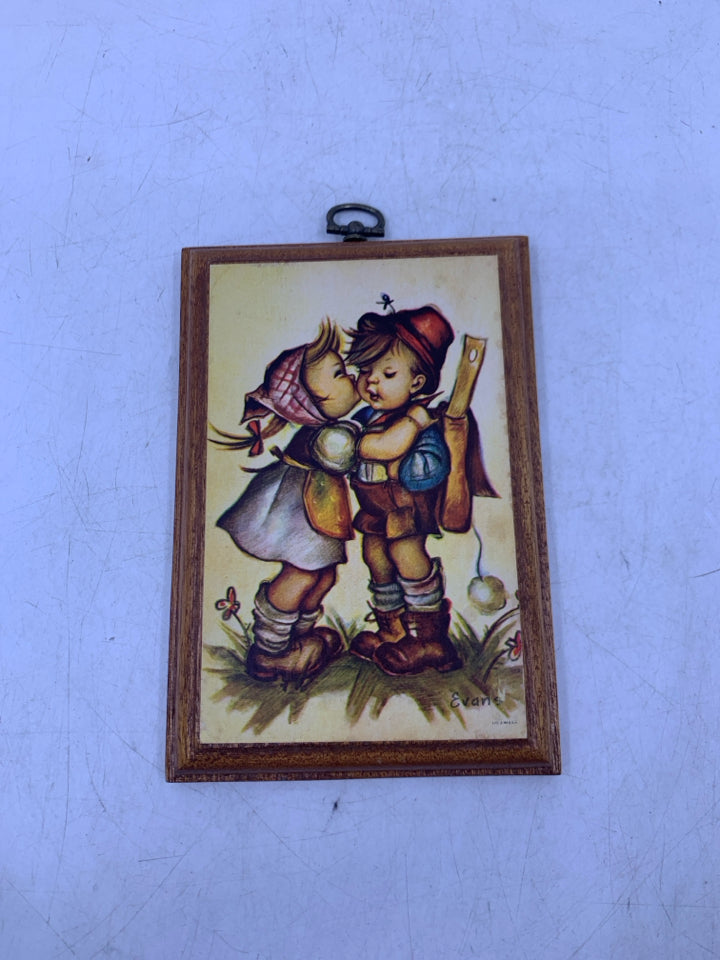 WOOD PLAQUE GIRL KISSING BOY ON CHEEK.