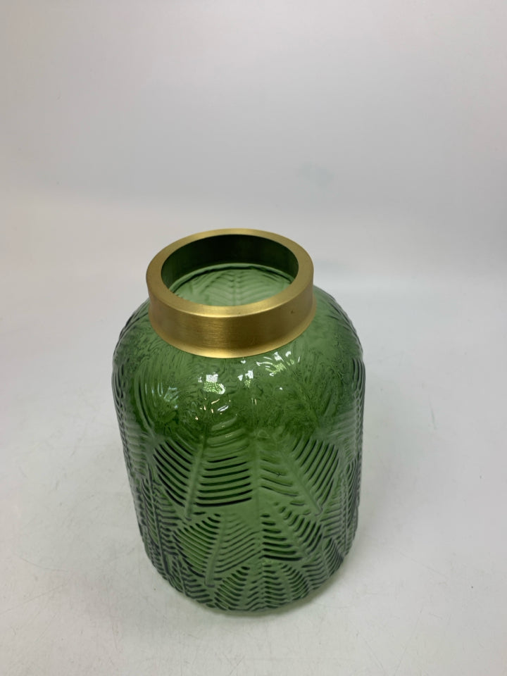 TEXTURED DARK GREEN VASE W/ GOLD METAL TOP.