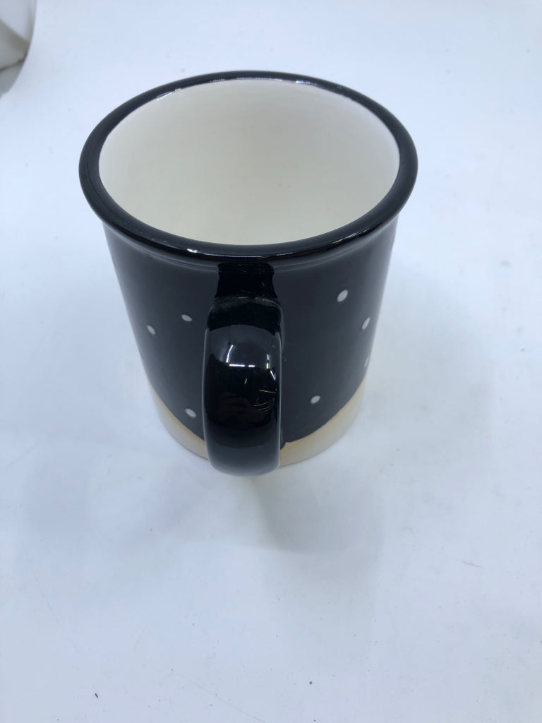 BLACK PRIMITIVE SNOWMAN MUG.