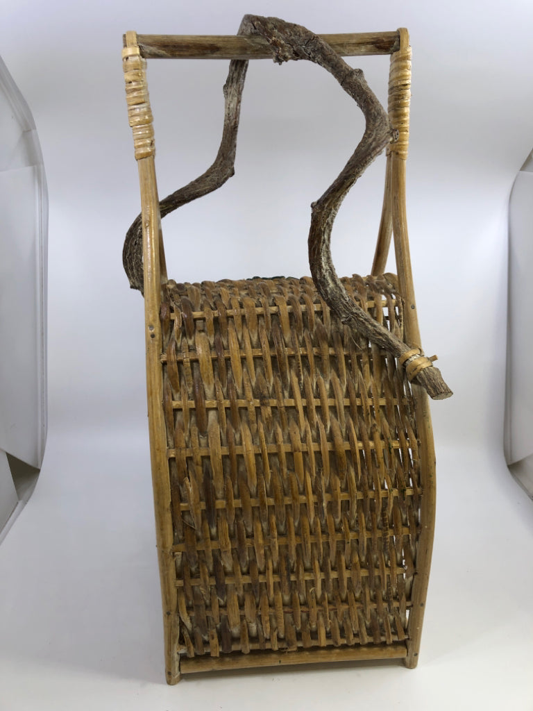 BASKET WEAVE WINE RACK W/GRAPE VINE DETAIL.