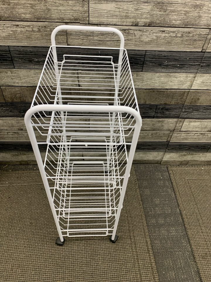 4 TIER WHITE WIRE BASKET SHELF ON WHEELS.
